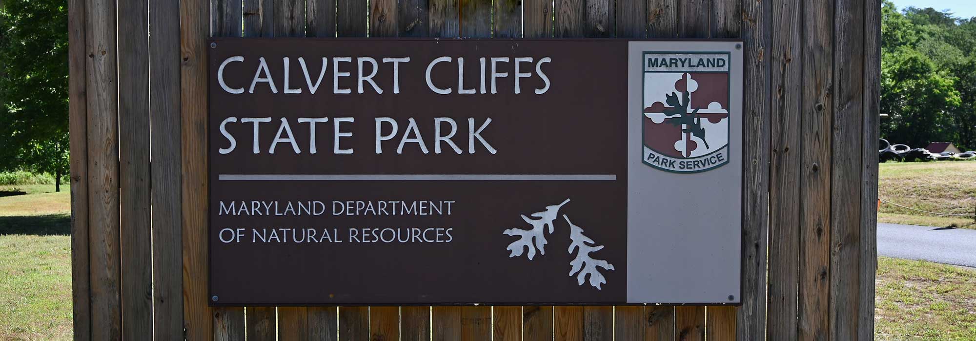 A sign that reads, Calvert Cliffs State Park. Maryland Department of Natural Resources